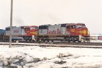Loaded coal train races east